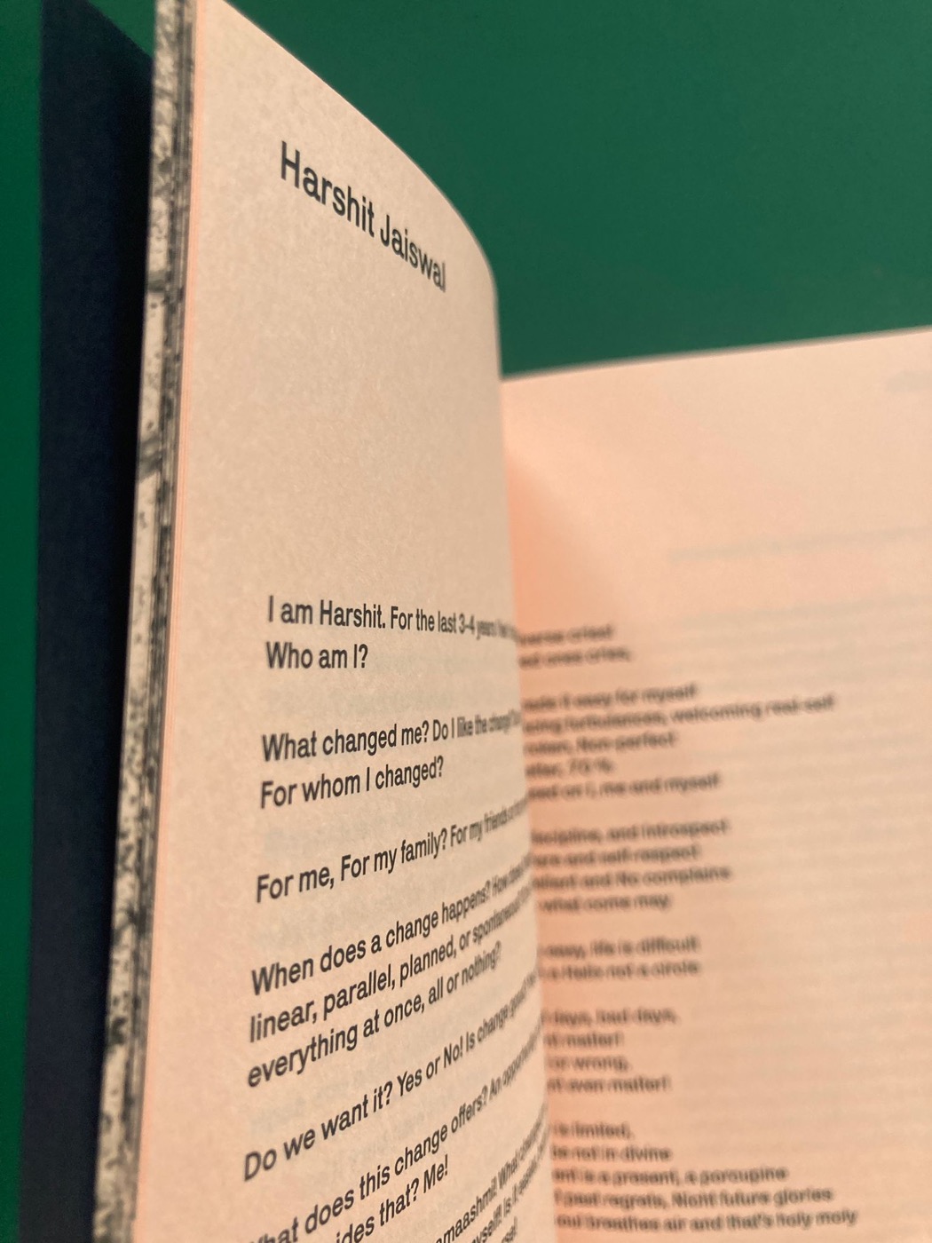 The first page of the poem in the book, under the name Harshit Jaiswal
